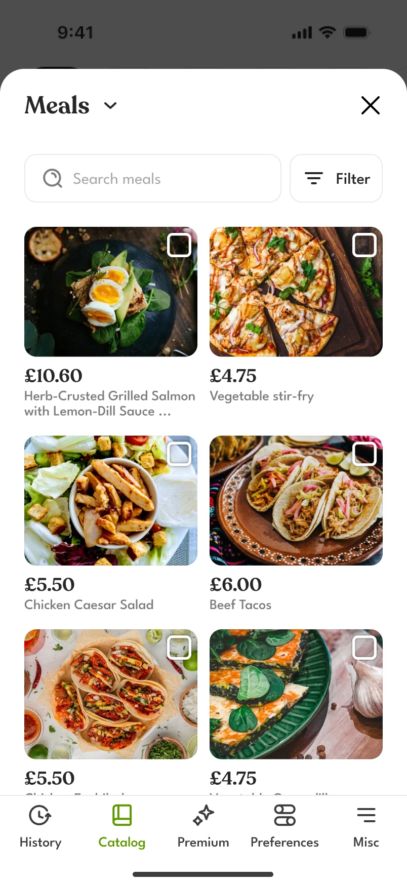 The catalog’s Meals sheet, open over the day: search, a Filter button and a grid of six dishes with prices, over the tab bar