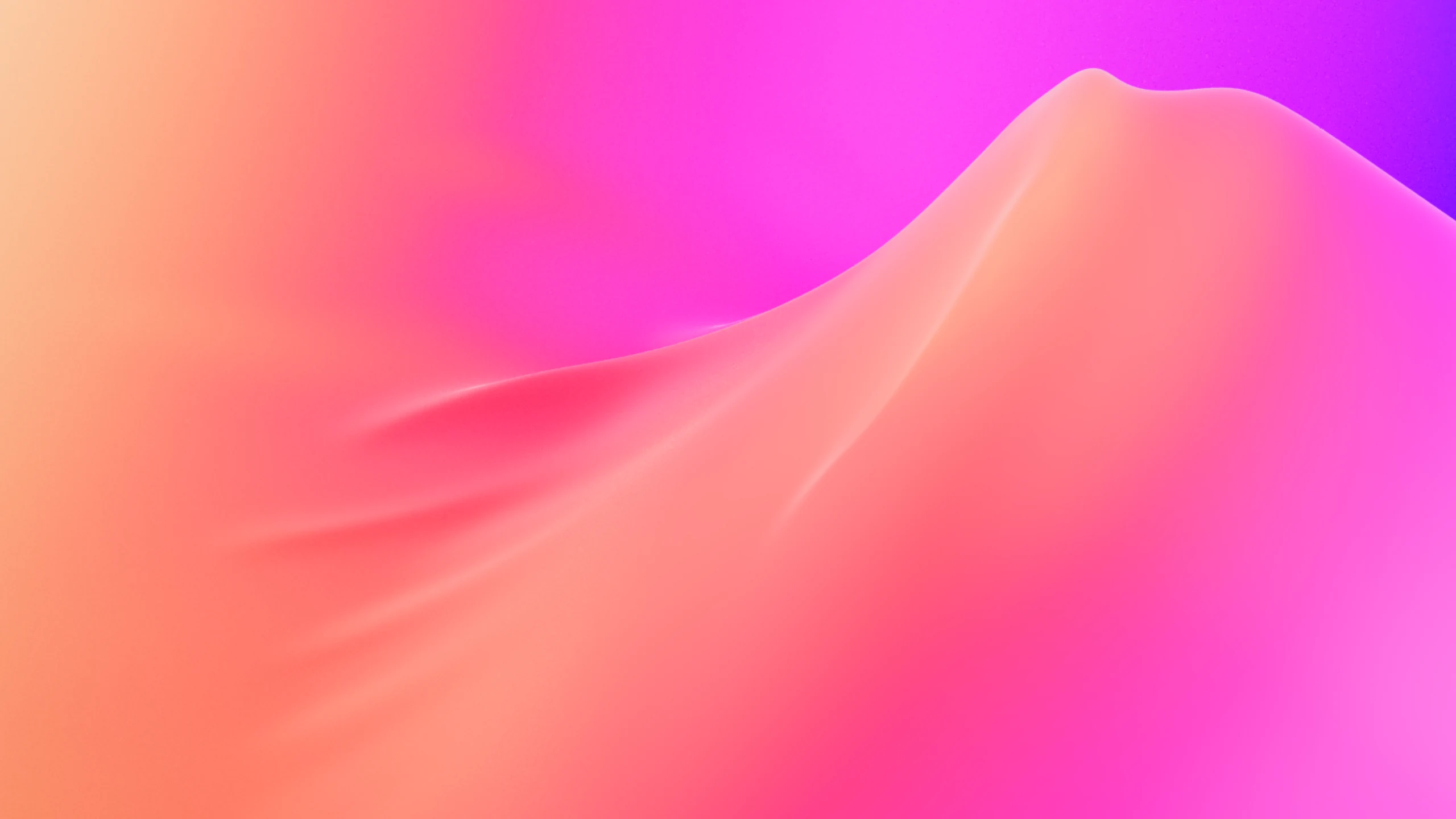 A peach and pink surface rising into a soft ridge