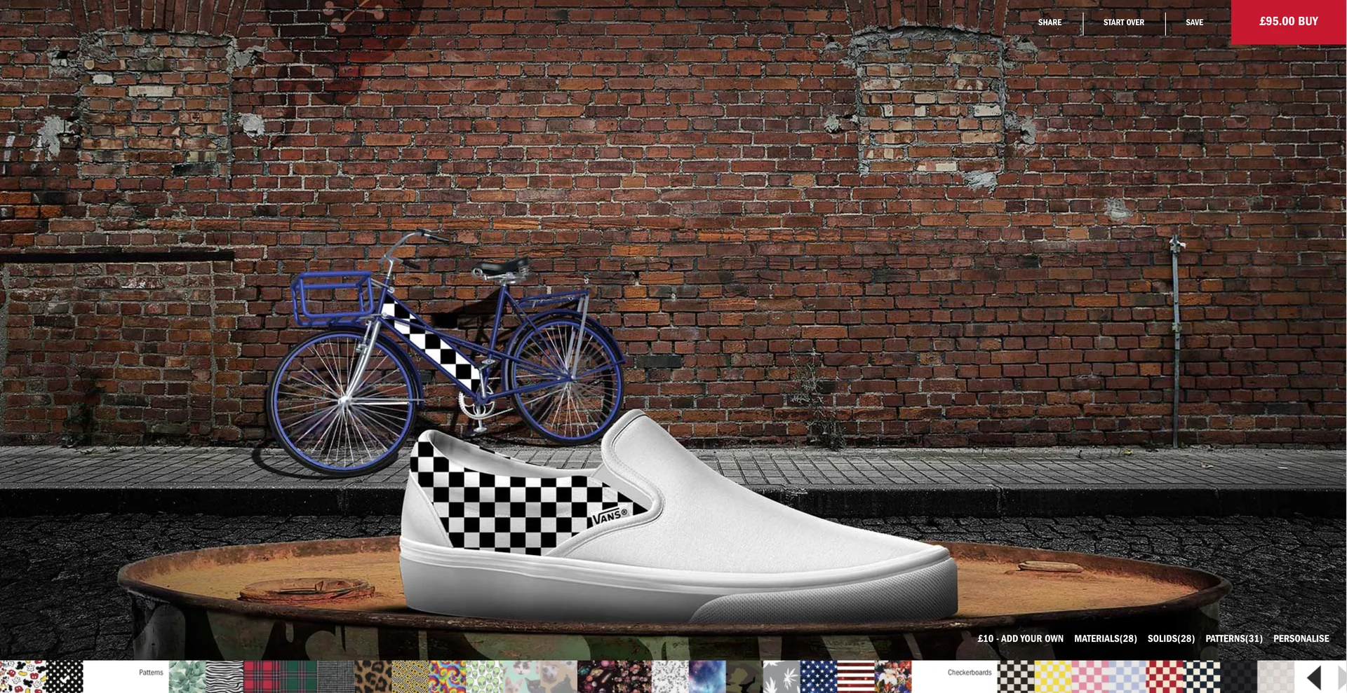 A checkerboard pattern, and a bicycle appears against the wall