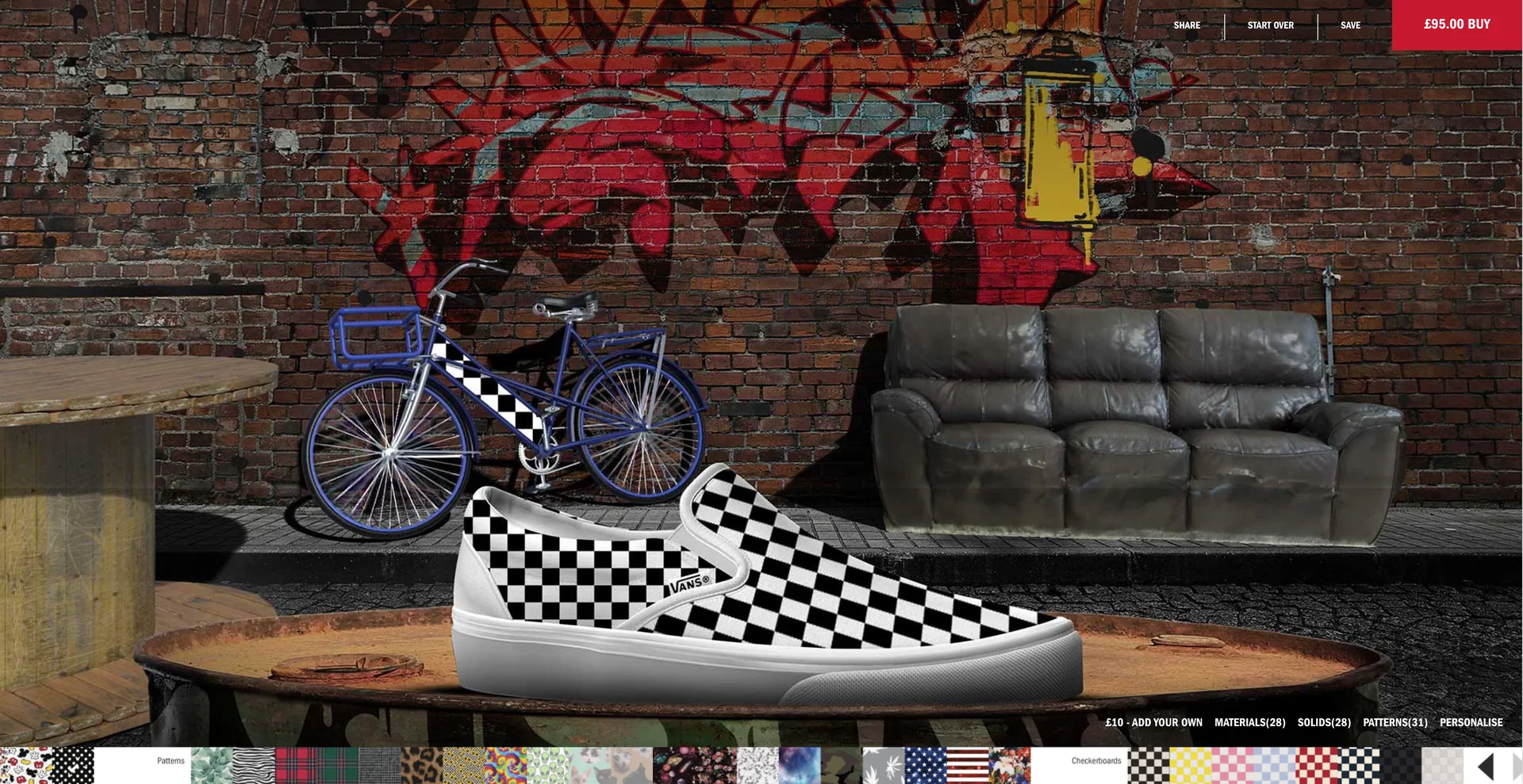 Graffiti covers the wall and a leather sofa arrives